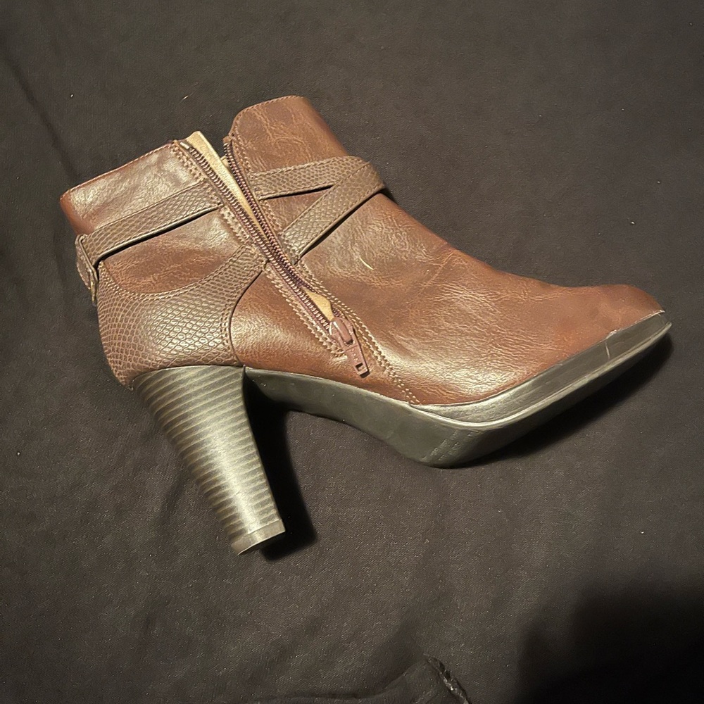 Ankle boot. Never worn without box.